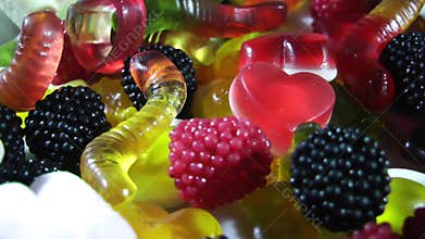 Sugar color chewy gelatin candy rotating on table