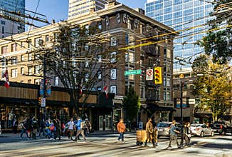 VANCOUVER, CANADA - September 25, 2018: City street in Downtown Vancouver evening time busy Robson Street.