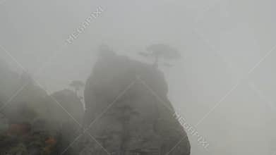 Fog in mountains. Shot. Fog in the mountains, and cloudy weather. Low clouds and fog on the mountain