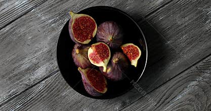 Halves of figs served on plate