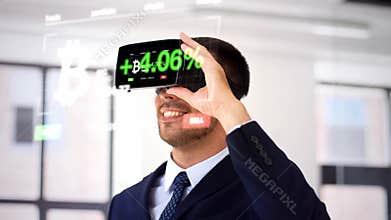 Businessman with virtual reality headset at office