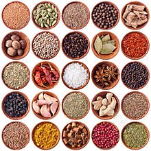 Set of wooden bowls full of different spices
