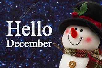 Hello December message with happy snowman with hat