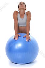 Beautiful Teen Girl Stretching on Exercise Ball