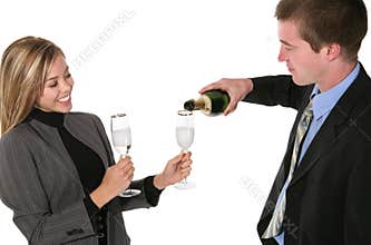 Business couple celebrating