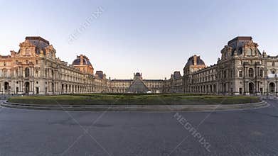 Paris, France, Timelapse - The Louvre museum in Paris from day to night