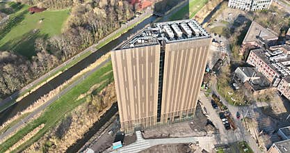 Data center telecommunication structure building aerial drone view. Digital computing storage database information