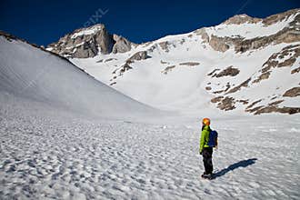 Alpinist looking at the summit to climb
