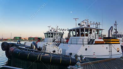 Two tugboats docked in the Port of Los Angeles harbor at San Pedro, California