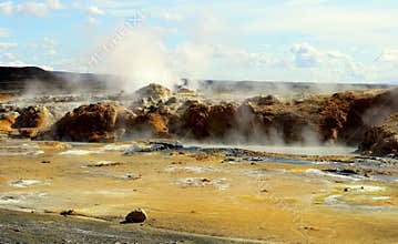 The view of smoking ground at Namafjall Hverir geothermal area near Lake Myvatn, Iceland