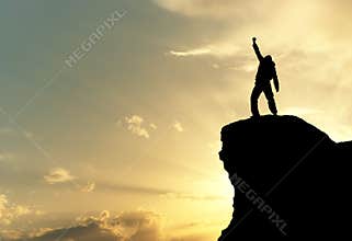 Man on top of mountain