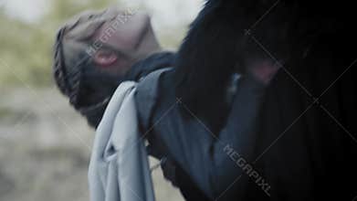 Medieval man is murdering a young blonde woman during a hug, 4k