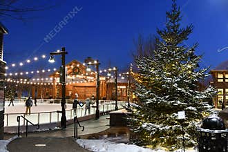 Stowe Mountain Ski Resort in Vermont, Ice Skating rink at Spruce peak village at night