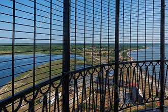 View to the Baltic sea and Sõrve peninsula through the protective grid  and railings from top of the Sõrve lighthouse