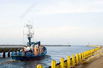 Boat leaving harbor