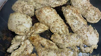 Marinated mustard chicken in the frying pan