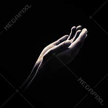 Open Hands Reaching Up in Prayer and Hope Against Dark Background