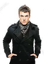 Poirtrait of young serious man