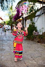 Pretty Chinese girl playing with bubble