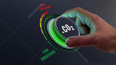 Lower CO2 emissions to limit global warming and climate change. Concept with manager hand turning knob to reduce levels of CO2.