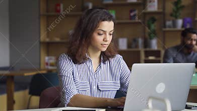 Hispanic girl student using laptop watching distance online seminar class.
