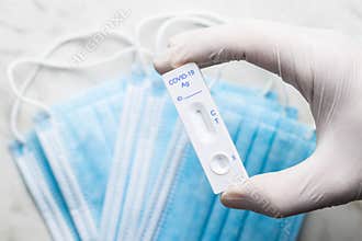 Covid-19 rapid antigen test. Rapid antibodies test kit in hand