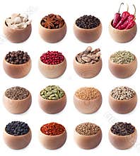 Set of wooden bowls full of different spices