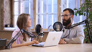 Podcasting of topical programme woman presenter man guest Spbas