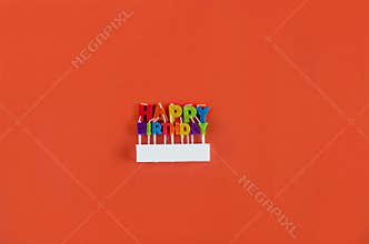 Birthday candles isolated on the orange background