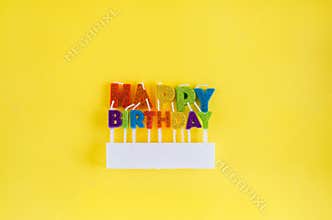 Birthday candles isolated on the yellow