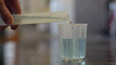 Plastic cylinder and beaker