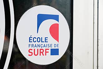 Ecole francaise de surf french surf school logo text with brand sign on surfing shop