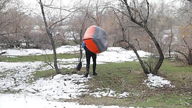 Man walk with paddle an raft boat