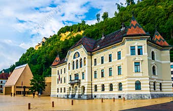 View of the guttenberg castle, old and new parliament building in Vaduz, Liechtenstein....IMAGE