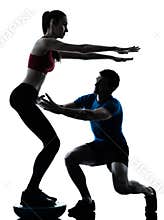 Coach man woman exercising squats on bosu