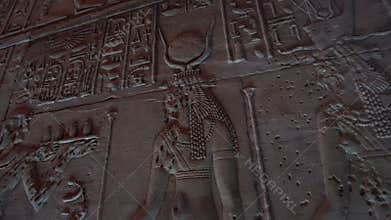 Philae temple aswan Egypt Isis hieroglyphic carved art on ruin wall goddess worship