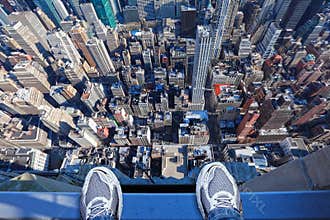 Feet on the edge of tall building vertigo