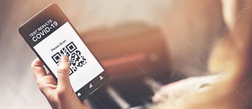 Woman using mobile phone application with covid-19 test results in airport. safe travel new normal. copy space