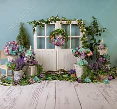 Turqoise spring sett up with colourful flowers pink , purple, bleu, and turqoise  flowers, vintage wood parquet