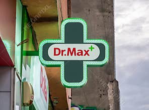 Dr. Max pharmacy,member of Penta investment group. Dr Max logo on a green cross in Bucharest