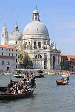 Travel the canals of Venice seeing the sights of architecture