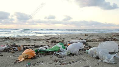 Plastic bottles discarded on pollution dump,ocean sea coast,environmental waste