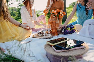Digital Detox, time for disconnecting from electronic devices. Mobile phones on basket on picnic background. Group of