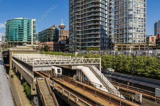 VANCOUVER, CANADA - APRIL 14, 2020: SkyTrain rapid transit system elevated rail road in downtown