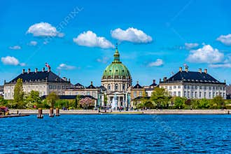 Frederik\'s Church known as The Marble Church and Amalienborg palace with the statue of King Frederick V in Copenhagen, Denmark