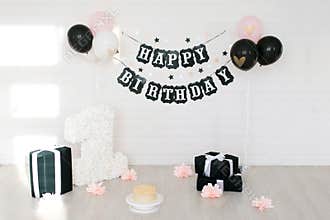 Decorated photo zone for 1 year birthday, for girls, cake, flowers, balloons black, white and pink, gifts