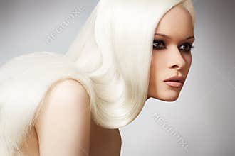 Beautiful chic model with long blond straight hair