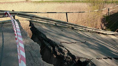Damaged concrete bridge. Consequences of flood. Damaged bridge on forest road.