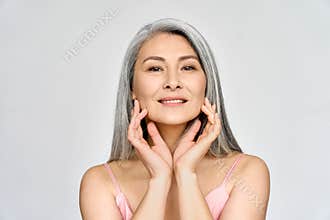 Senior happy middle aged mature asian woman headshot portrait. Skin care advertising.