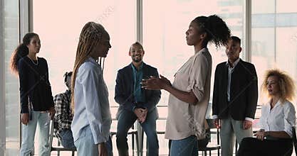 African leader and staff congratulate colleague with promotion career advance